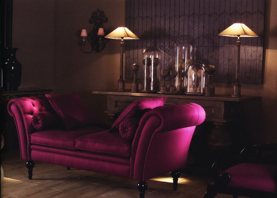 PINK UPHOLSTERED SOFA WITH WOODEN LEGS