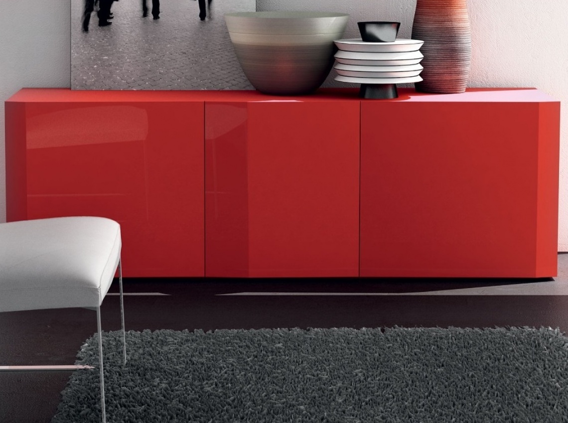 THREE-DOOR SIDEBOARD WITH INCLINED SHAPE, LACQUERED IN GLOSSY RED