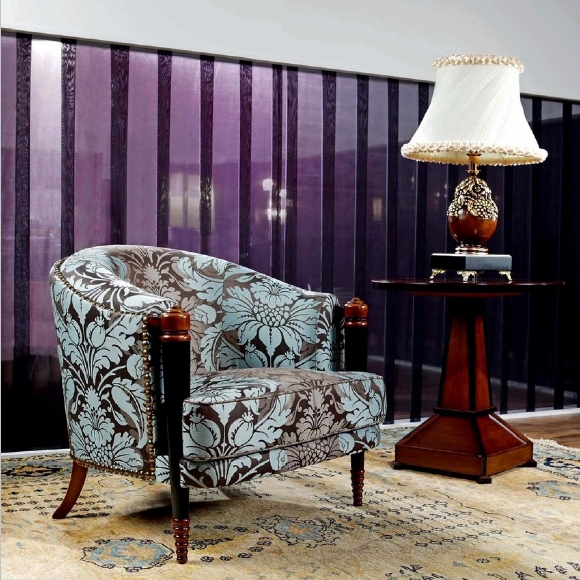 ARMCHAIR UPHOLSTERED IN PRINT WITH LARGE TACK