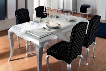 DINING TABLE IN A SILVER FINISG WITH AN INTERIOR EXTENSION